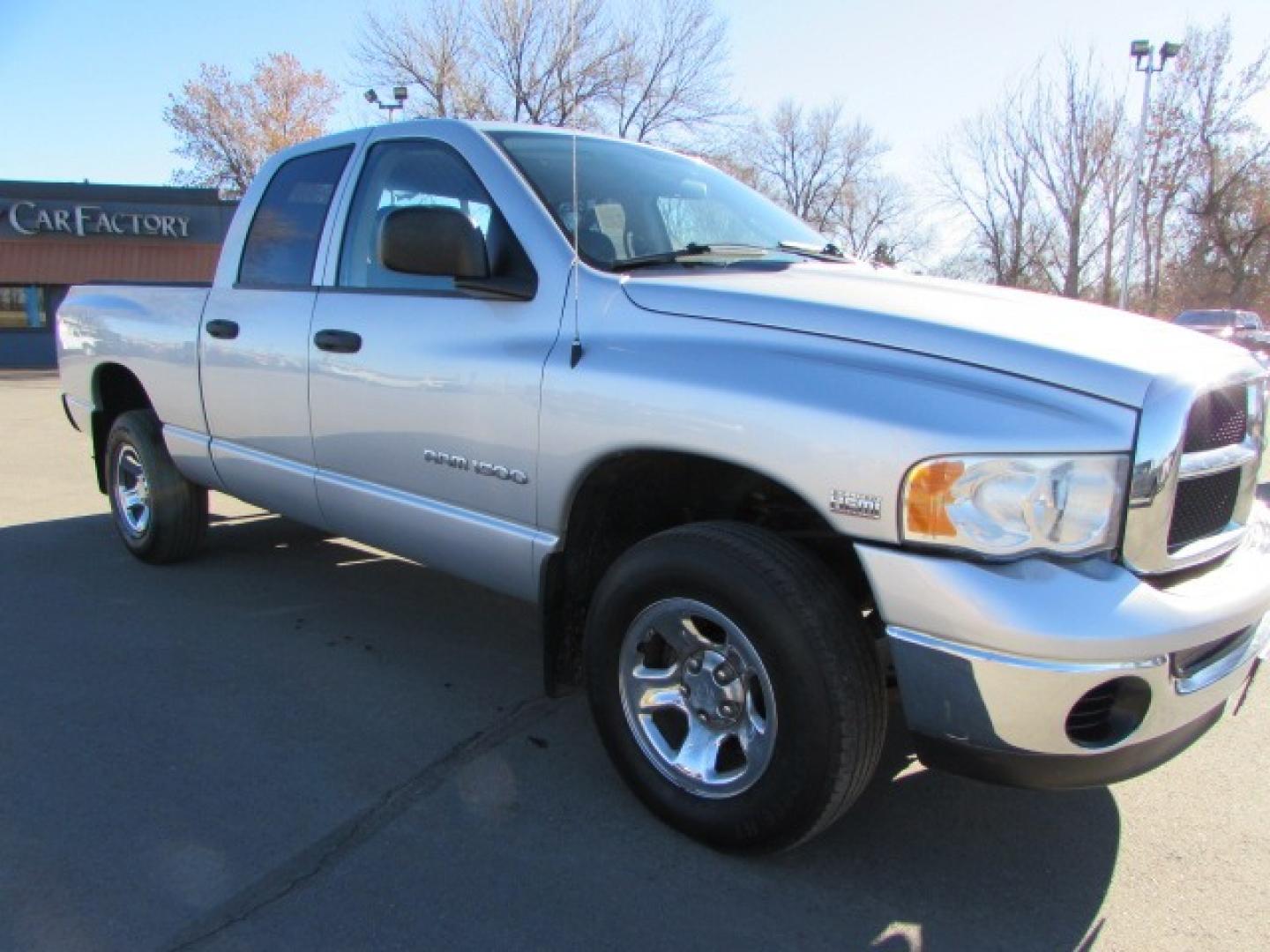 2005 Silver /Gray Dodge Ram 1500 SLT (1D7HU18D15S) with an 5.7 Hemi V8 engine engine, 5 speed automatic transmission, located at 4562 State Avenue, Billings, MT, 59101, (406) 896-9833, 45.769516, -108.526772 - 2005 Dodge Ram 1500 SLT Quad Cab Short Bed 4WD 5.7L V8 OHV 16V Hemi Engine - 5 speed automatic transmission - 4 wheel drive - 159,014 miles SLT package - air conditioning - tilt wheel - cruise control - AM/FM/CD audio - power windows and door locks - power drivers seat - privacy glass - keyles - Photo#5